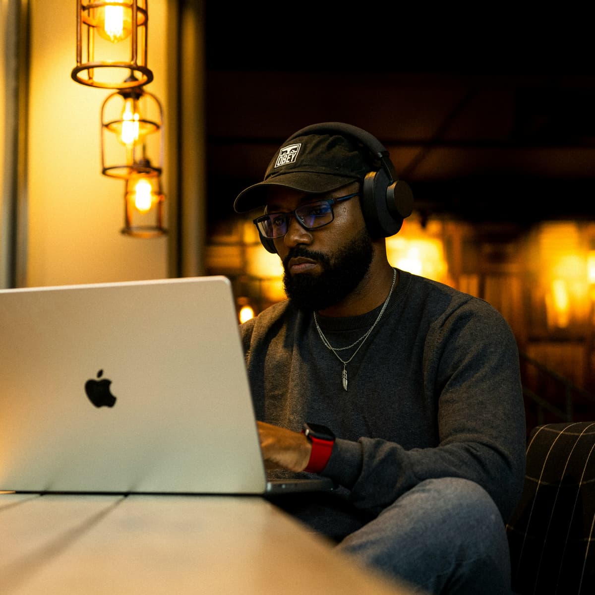Happy student learning tech skills on laptop